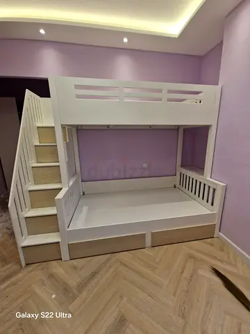 Customised wooden bunk bed with storage stairs – good condition