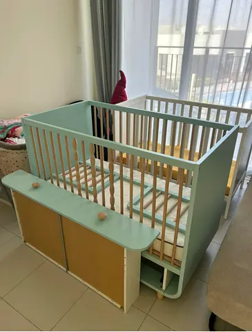 Ikea Myllra Convertible baby crib with attached storage dresser - light green-excellent condition