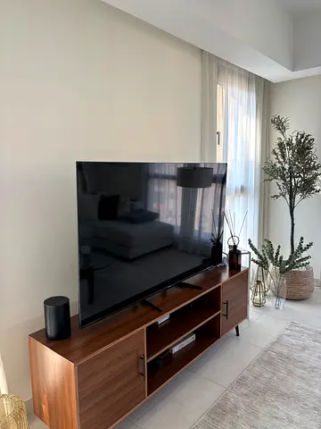 Prism 65-inch HD Smart TV (Good Condition) with Stand