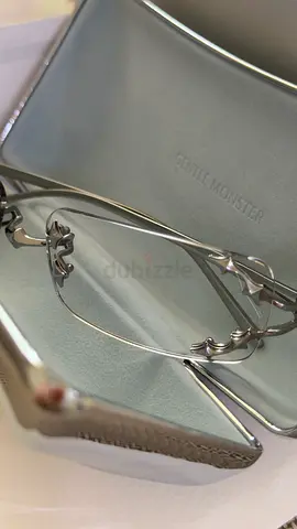 Gentle Monster rimless glasses with original case