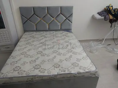 Grey upholstered bed frame with mattress - single/small double