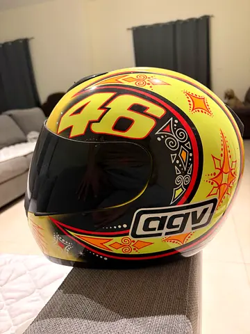 Original AGV K2 full-face motorcycle helmet in iconic Valentino Rossi #46 VR46 design. Bright yello