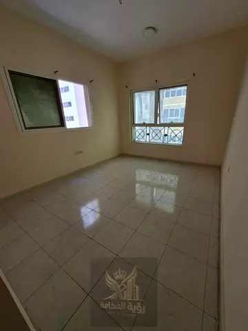For annual rent in Sharjah Al Qasimia Al Mahatta one bedroom and living room central AC and gas second tenant AED 28000 deposit AED 2000 cash 4 or 6 p