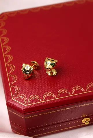 Gold panther head cufflinks with green enamel eyes - classic men's accessory