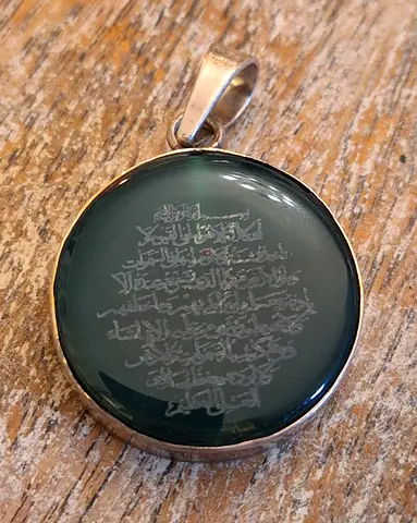 Silver pendant with original jade stone
