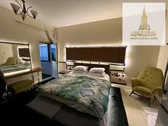 For rent: Furnished studio with hotel-style furniture, a balcony, swimming pool, gym, and private pa