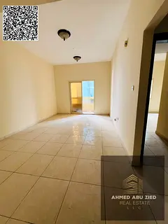 Annual 1BHK for rent in Al Nuaimiya 2, Ajman, near Afghan Kebab. Open view balcony, free parking, 4