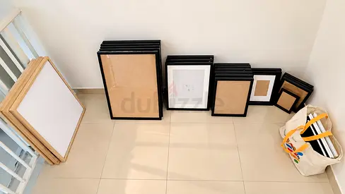 Set of assorted black photo frames (multiple sizes) - good condition
