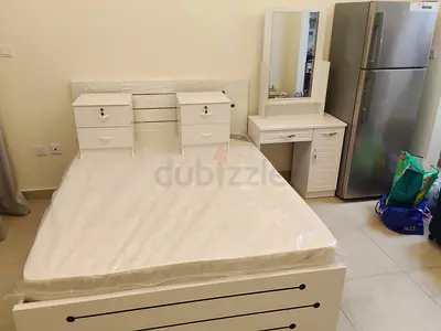 White double bed frame with mattress and matching dressing table set