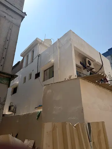 Building for Sale Location: Al Rumaila 1 - Near Ajman Cor
