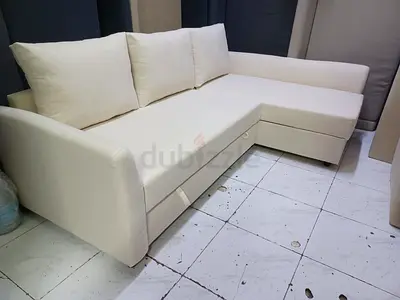 Beige L-shaped Sofa with Storage - Good Condition