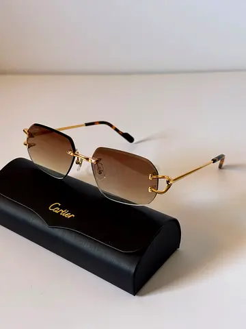 Cartier rimless gold sunglasses with brown gradient lenses