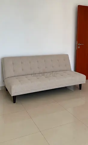 Light beige convertible sofa bed - good condition