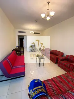Luxury furnished 1-bedroom apartment in Orient Towers, Al Bustan, Ajman, open creek view, master bed