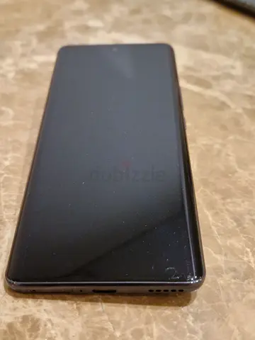 Used smartphone in good working condition - black, minor wear