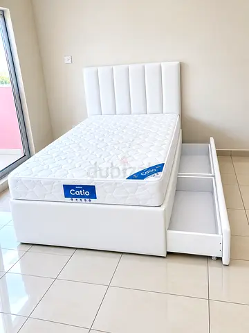 Brand new twin 120x190 size storage bed including spring mattres available