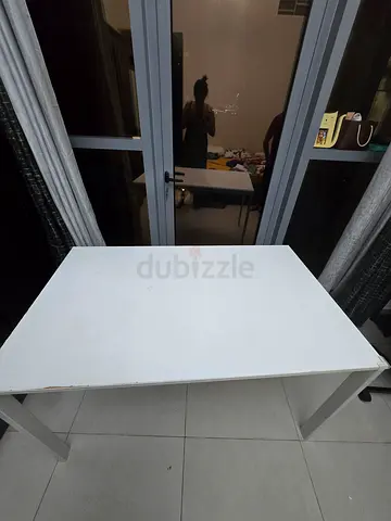 Simple white rectangular work table from Ikea, super sturdy- good condition.