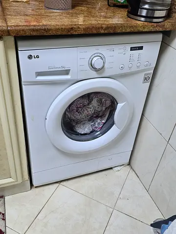 Old LG washing machine that has a problem with the turn on button that dose not work