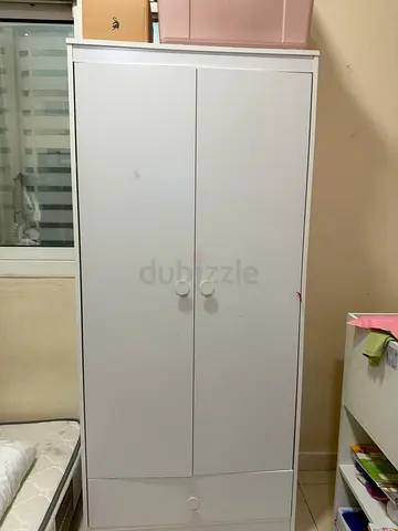 Modern White Two-Door Wardrobe with Round Knobs