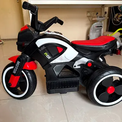 Urgent selling leaving home counKids 3-Wheel Electric Ride-On Motorcycle — Red/Black, Good Condition