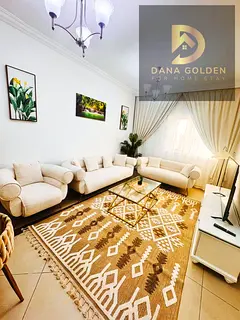 For monthly rent: three rooms, two living areas, and three bathrooms in Al Taawun, Sharjah.