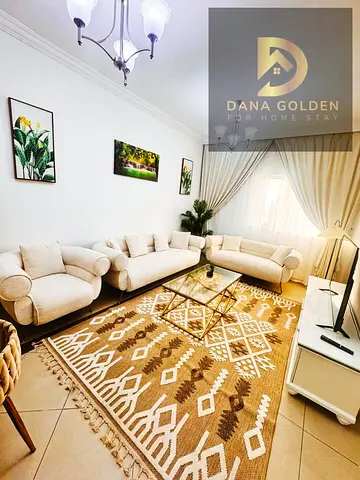For monthly rent: three rooms, two living areas, and three bathrooms in Al Taawun, Sharjah.