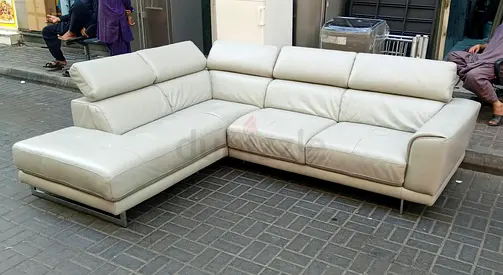 NATUZZI grey L-shaped leather corner sofa with chaise — good condition