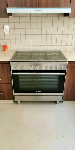 Bosch stainless steel Gas cooker with oven - good condition
