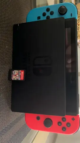 Nintendo Switch Console + Mario Kart 8 Deluxe game