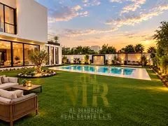 Villa in Al Zorah Golf Community, Ajman; includes electricity, water, and air conditioning. Freehold