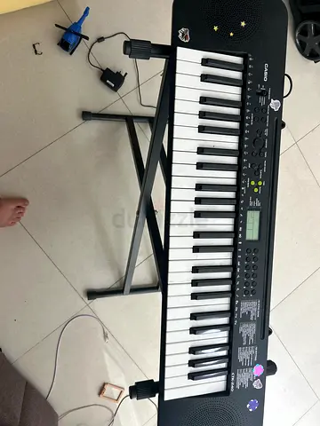 Casio CTK-240 61-Key Portable Keyboard with Stand and Adapter