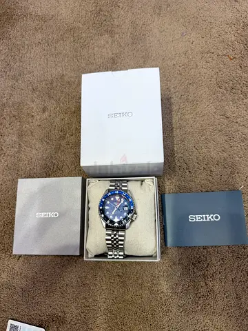 Seiko stainless steel men's watch with original box - good condition