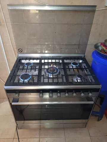 Gas stove with microwave