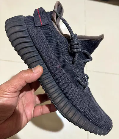 Used black Yeezy sneakers - size shown inside (read description)
