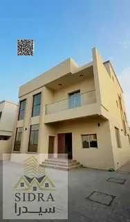 A villa with many features, including spacious master bedrooms, two living rooms, a majlis, and cent