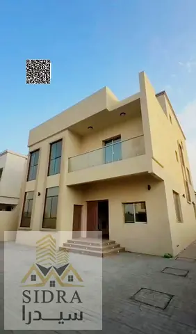 A villa with many features, including spacious master bedrooms, two living rooms, a majlis, and central air conditioning,