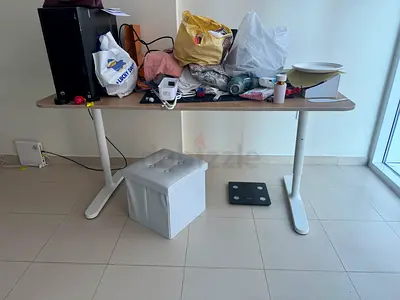 Height-adjustable standing desk with wood top (used)
