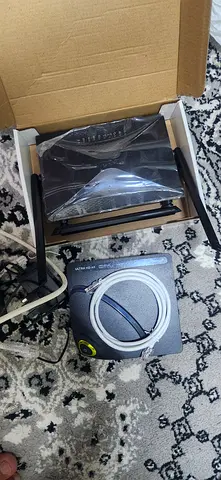 Used Wi‑Fi Router and Modem Bundle - Good Working Condition