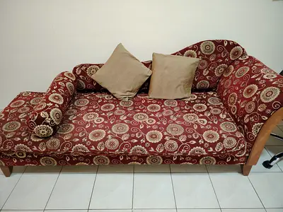 Red patterned chaise lounge / daybed with cushions