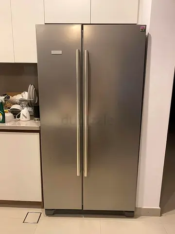 Side-by-side stainless steel refrigerator - good condition