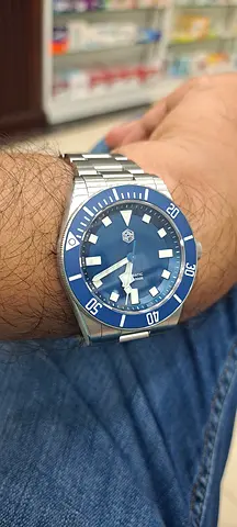 San Martin Men's stainless steel sport watch with blue dial and bezel - good condition
