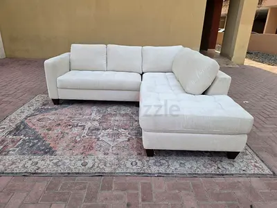 Available high quality Natuzzi Lsahpe sofa