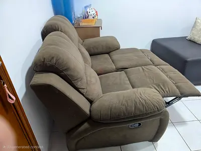 Recliner two seater sofa for sale immediately (as good as new)