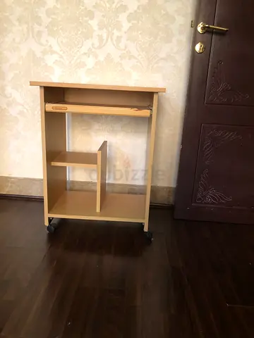 Computer table with shelves