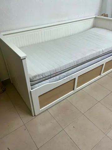 IKEA HEMNES daybed frame in white, featuring three built-in storage drawers.