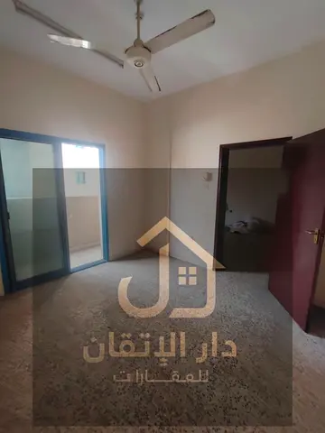 A golden opportunity for rent: a spacious 3-bedroom and hall apartment in Al Shuweiheen area