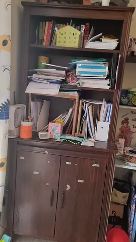 Dark wood bookcase with cabinet — good for home office