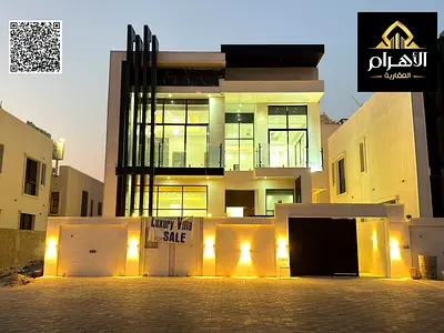 Modern villa for sale in Al Amra, Ajman. Prime location directly on Sheikh Mohammed Bin Zayed Road, behind the Azha Residential Complex. Freehold owne