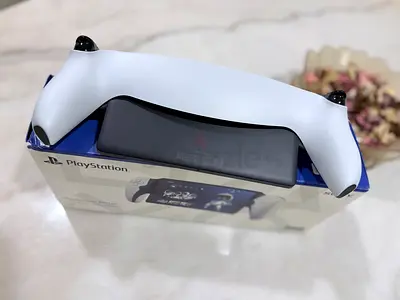 Sony DualSense Wireless Controller (White) - Like New. Includes a case, screen protector, and plasti