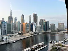 1BR Apartment | Burj & Canal View | Furnished